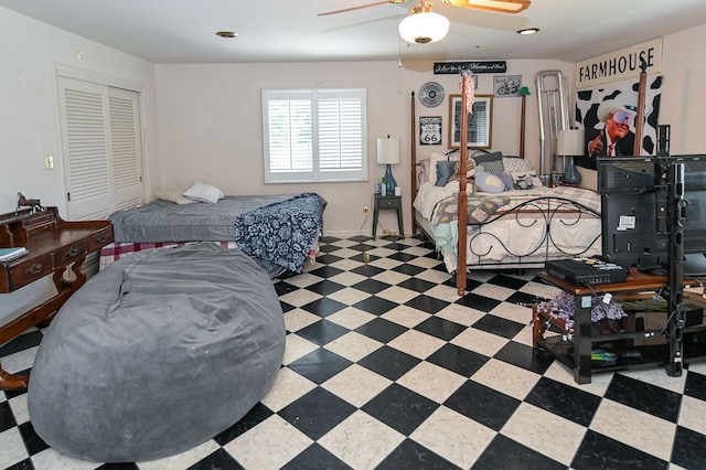 bedroom featuring ceiling fan and a closet