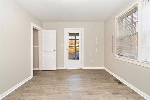 empty room with light wood-type flooring