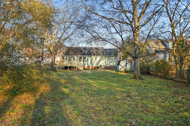 view of yard featuring a wooden deck