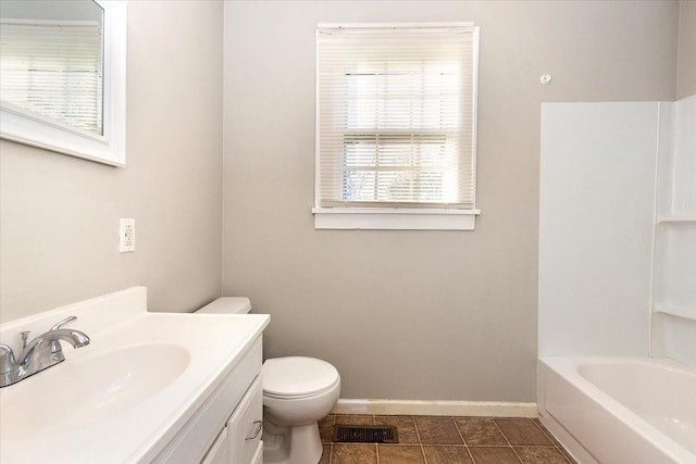 full bathroom with tile patterned flooring, vanity, toilet, and tub / shower combination