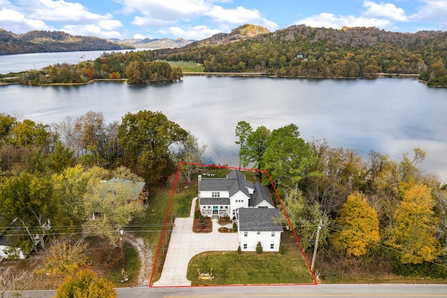 bird's eye view with a water and mountain view