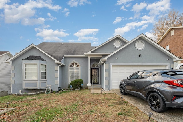 single story home featuring a garage