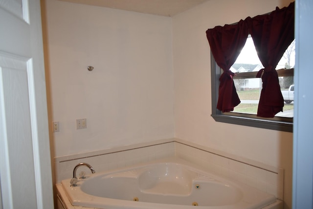 bathroom featuring a washtub