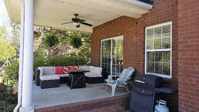 view of patio featuring a grill and ceiling fan