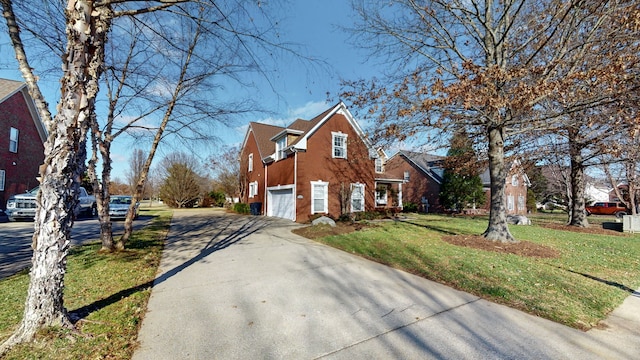 view of home's exterior with a yard and a garage