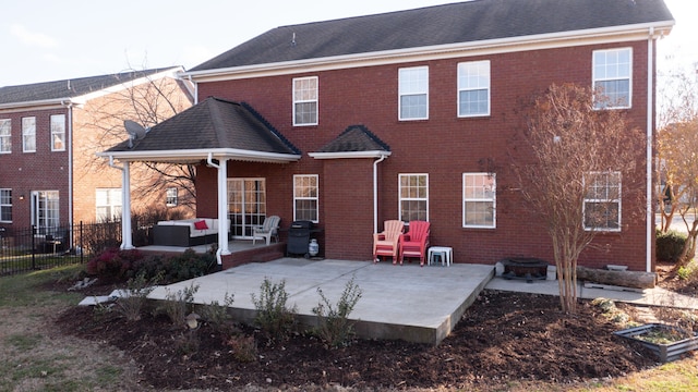 back of house featuring a patio area