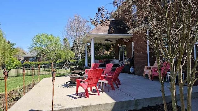 view of patio featuring ceiling fan