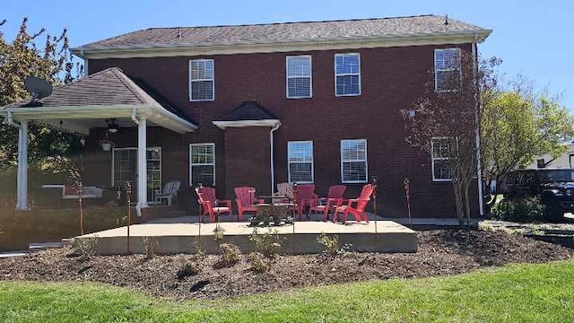 rear view of house featuring a patio