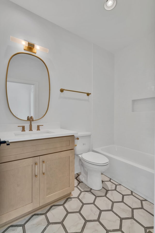 full bathroom featuring shower / washtub combination, vanity, and toilet