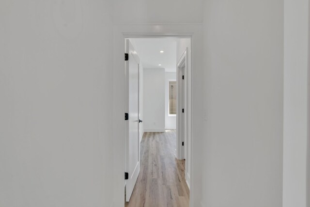 corridor featuring light wood-type flooring