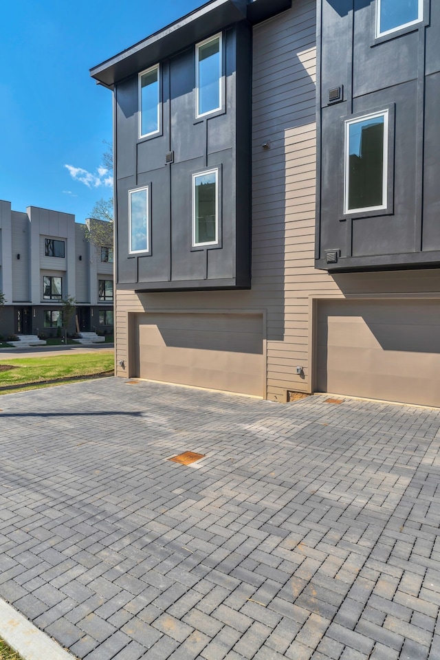 view of home's exterior with a garage