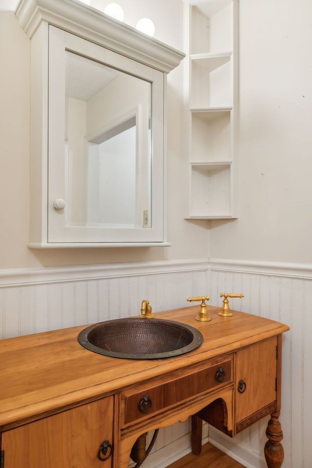 bathroom featuring vanity and built in features