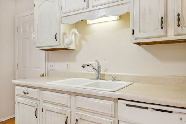 kitchen featuring dishwasher and sink