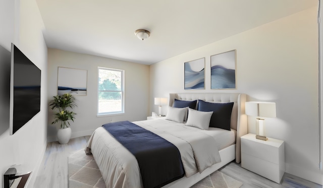 bedroom featuring light wood-type flooring