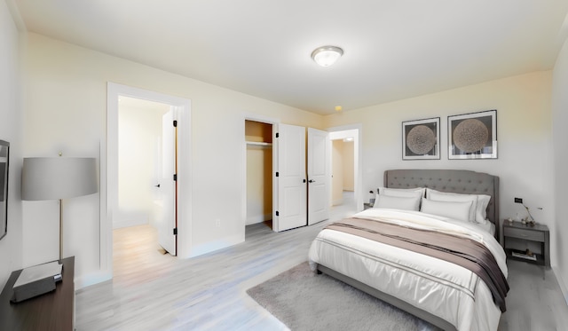 bedroom featuring light wood-type flooring