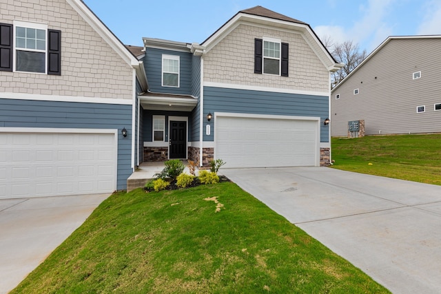 craftsman-style home featuring a front lawn and a garage