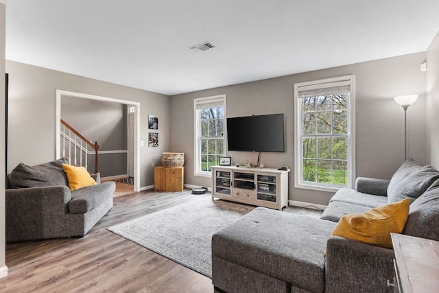 living room featuring light wood-type flooring