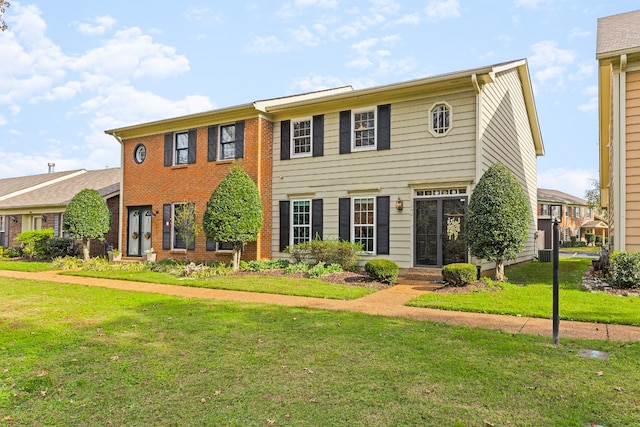 view of front of property featuring a front lawn