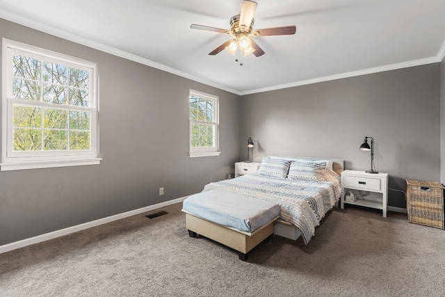 bedroom featuring ceiling fan, carpet floors, and crown molding