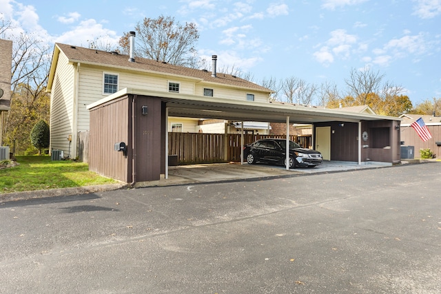 view of parking with a carport