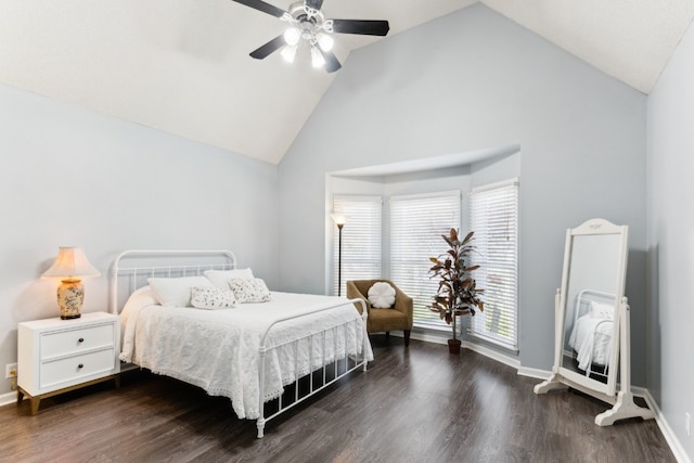 bedroom with high vaulted ceiling, ceiling fan, and dark wood-type flooring