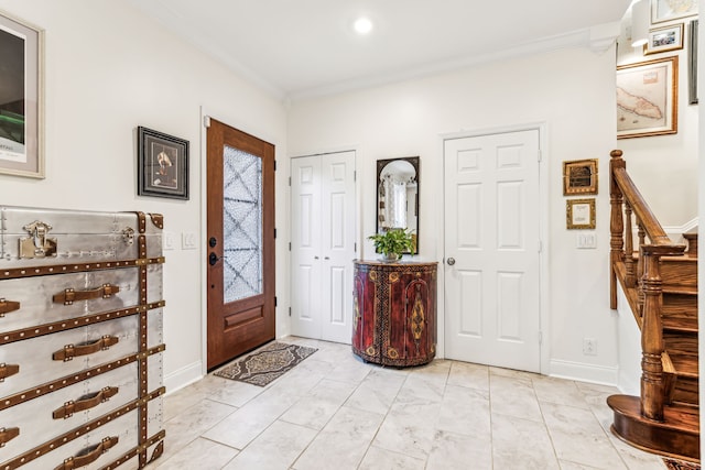 foyer with ornamental molding