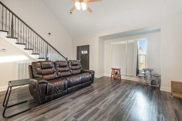 living room with hardwood / wood-style floors, high vaulted ceiling, and ceiling fan