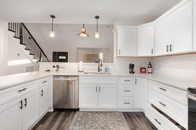 kitchen featuring dishwasher, sink, hanging light fixtures, dark hardwood / wood-style flooring, and white cabinets