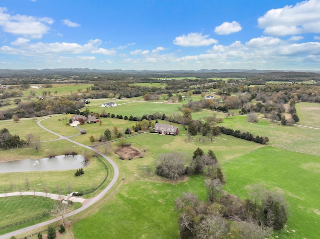 drone / aerial view with a water view and a rural view