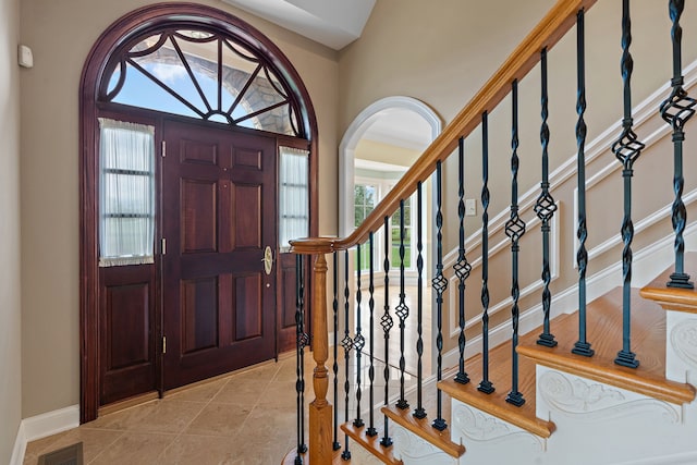 entrance foyer featuring light tile patterned floors