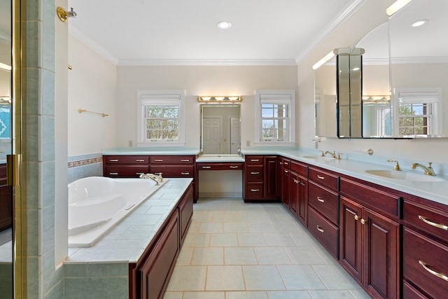 bathroom with tile patterned flooring, vanity, ornamental molding, and shower with separate bathtub