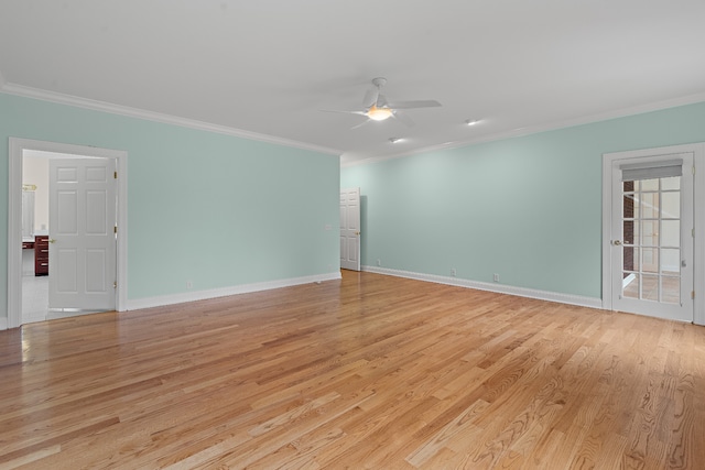 empty room with light wood-type flooring, ceiling fan, and crown molding