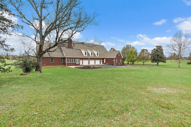 view of yard with a garage