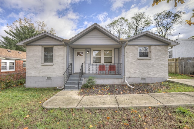 view of front of property featuring covered porch