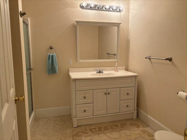 bathroom with vanity and an enclosed shower