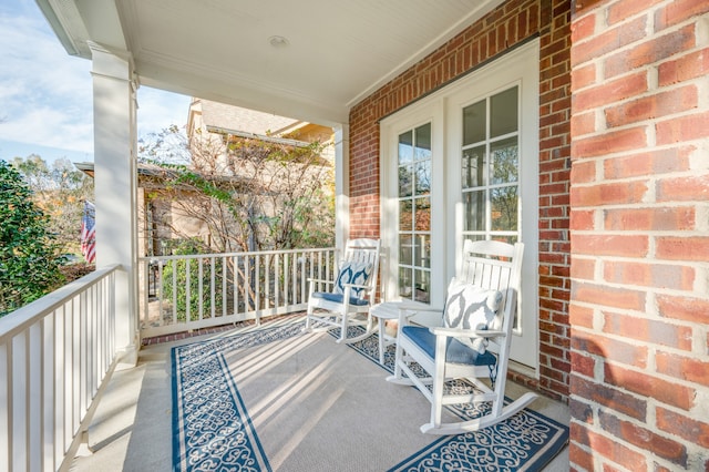 balcony featuring a porch