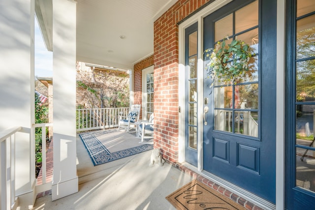 entrance to property with a porch