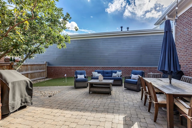 view of patio / terrace featuring grilling area and outdoor lounge area