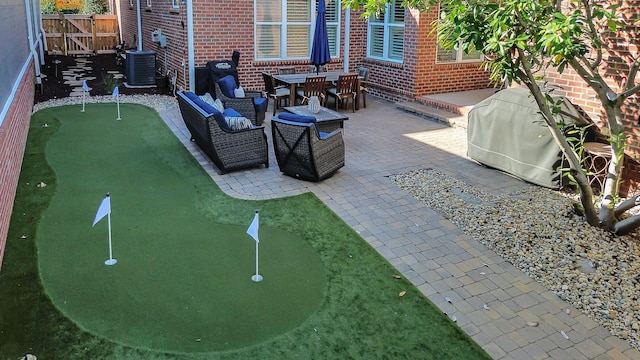 view of patio with central AC