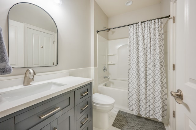 full bathroom with vanity, toilet, and shower / bathtub combination with curtain