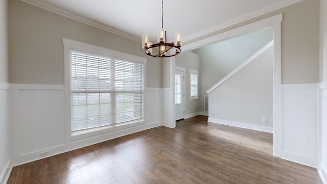 interior space with crown molding, dark wood-type flooring, and a chandelier