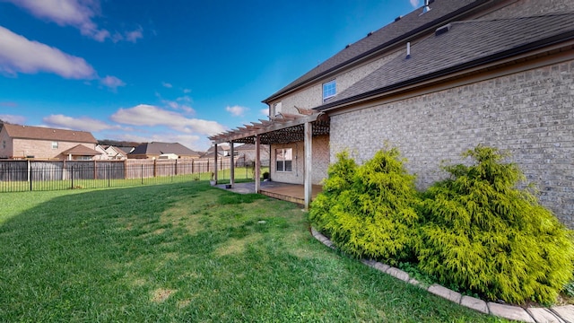 view of yard with a pergola and a patio