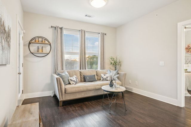 living room featuring dark hardwood / wood-style floors