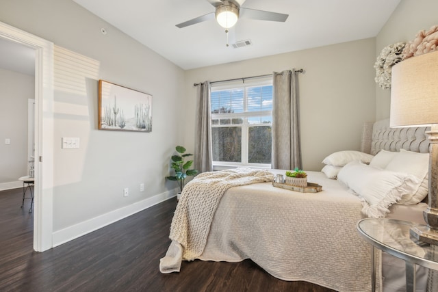 bedroom featuring dark hardwood / wood-style flooring and ceiling fan