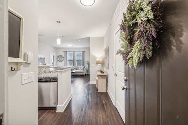 hall with dark hardwood / wood-style flooring