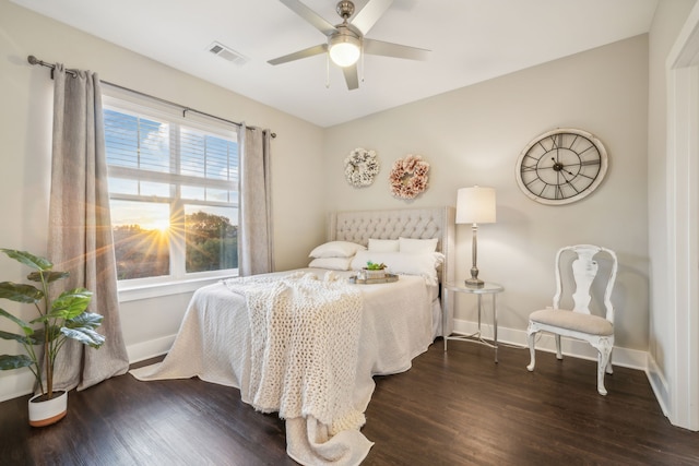 bedroom featuring ceiling fan and dark hardwood / wood-style floors