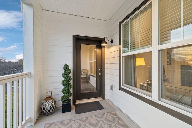 entrance to property with covered porch