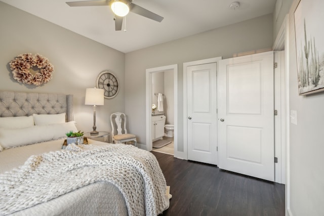 bedroom featuring ensuite bathroom, ceiling fan, and dark wood-type flooring