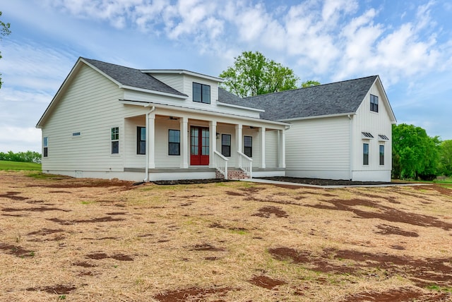 view of front of property featuring covered porch