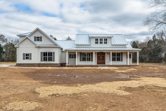 modern farmhouse style home featuring a porch